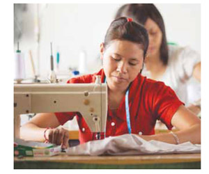 Worker using sewing machine